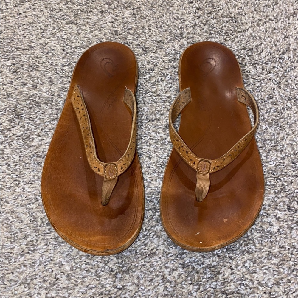Women’s Olukai orthopedic arch support sandals.